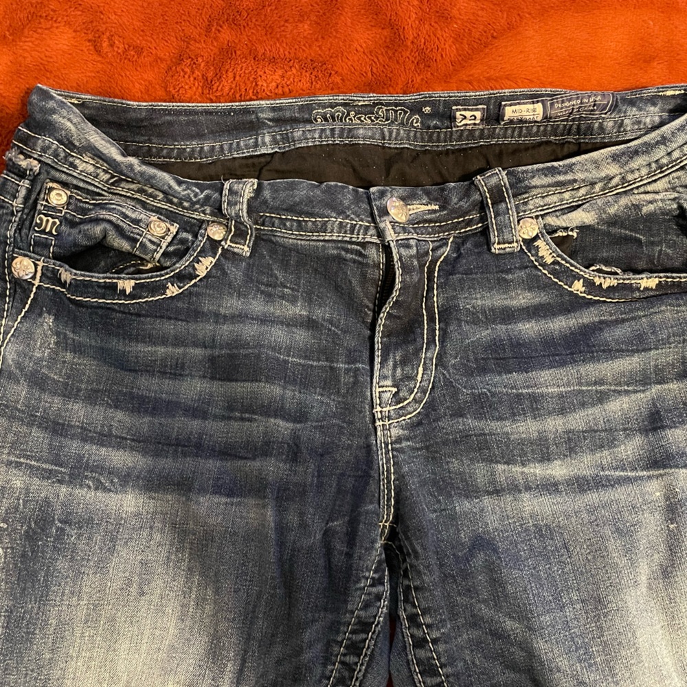 Mid rise easy boot miss me jeans